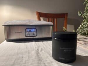 L reuteri yogurt benefits shown with Ultimate Yogurt Maker and Lactobacillus reuteri jar during fermentation